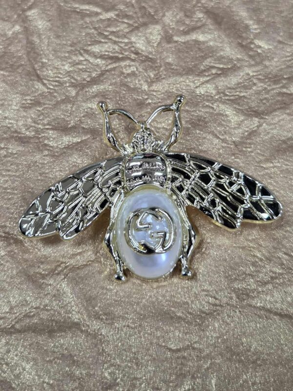 Legendary Marie Brooches 1